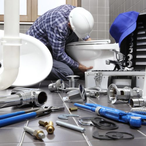 Plumber,At,Work,In,A,Bathroom,,Plumbing,Repair,Service,,Assemble