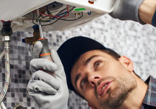 Set,Up,Boiler.,Worker,Set,Up,Electric,Heating,Boiler,At