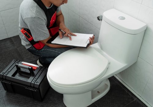 Handyman,Holding,Fixing,List,Checking,What,It,Need,To,Be