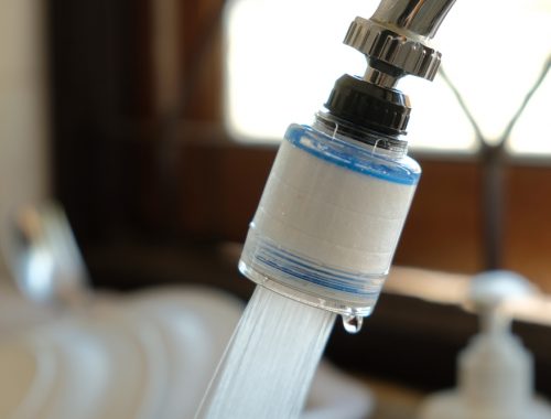 Tap,Water,Is,Flowing,Through,The,Filter.water,Through,The,Filter