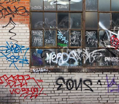 Grungy,Alleyway,In,Denver,Colorado,With,Graffiti.